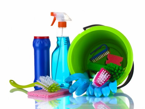 Carpet cleaning technician preparing equipment safely
